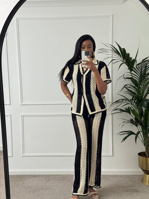 River Island Black Stripe Crochet Polo Top & Flared Trousers co-ord set.