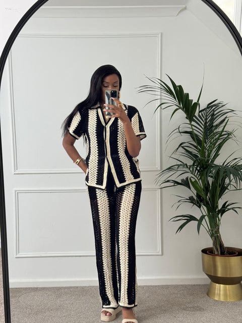 River Island Black Stripe Crochet Polo Top & Flared Trousers co-ord set.